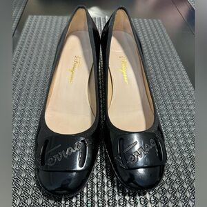 Salvatore Ferragamo Black Flats Timeless Elegance